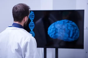 Intertwined hands of a patient and a doctor, symbolizing compassion, trust, and the personalized care at Regencord for neurological treatments.